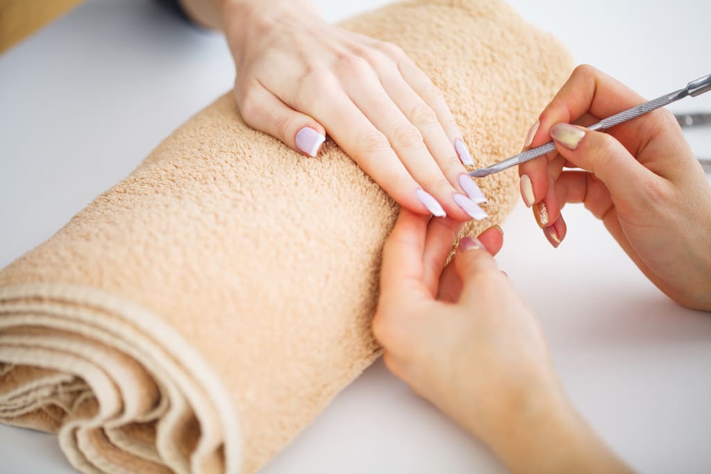 Beautician giving a manicure